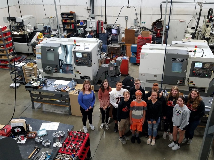 students in a manufacturing plant