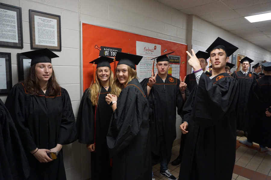 graduates smiling