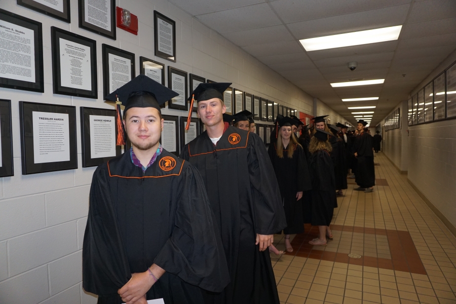 graduates smiling