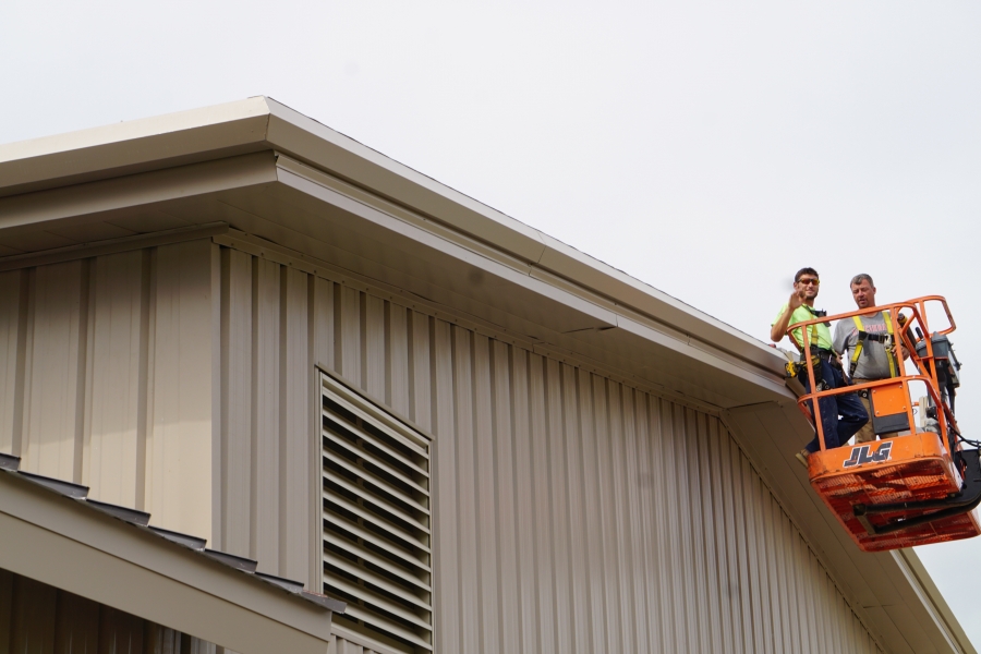 two guys in a crane lift