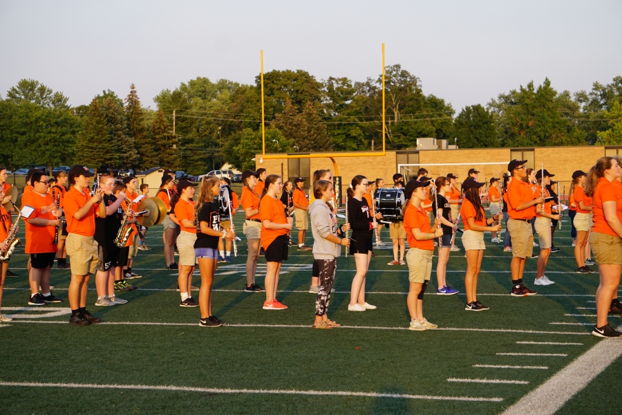 band members wearing orange