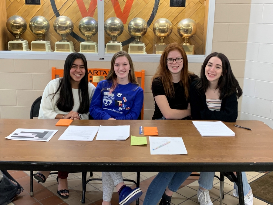 four girls at a table